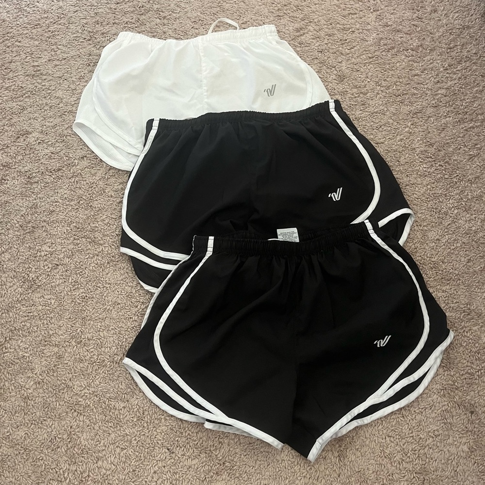 3 pairs of varsity athletic shorts. 2 black=Small. 1 white= XS(fits like small)